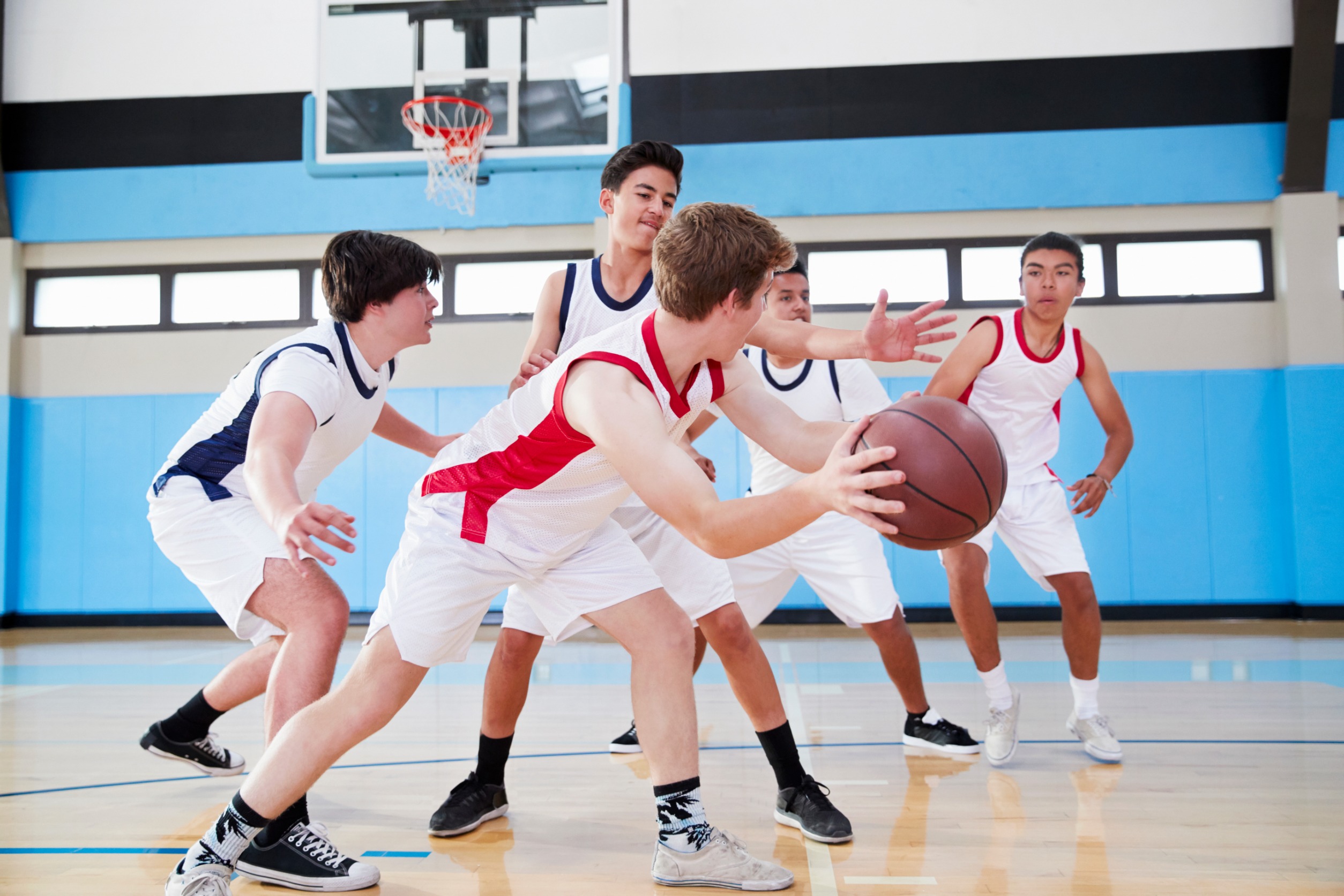 Kids playing basketball.