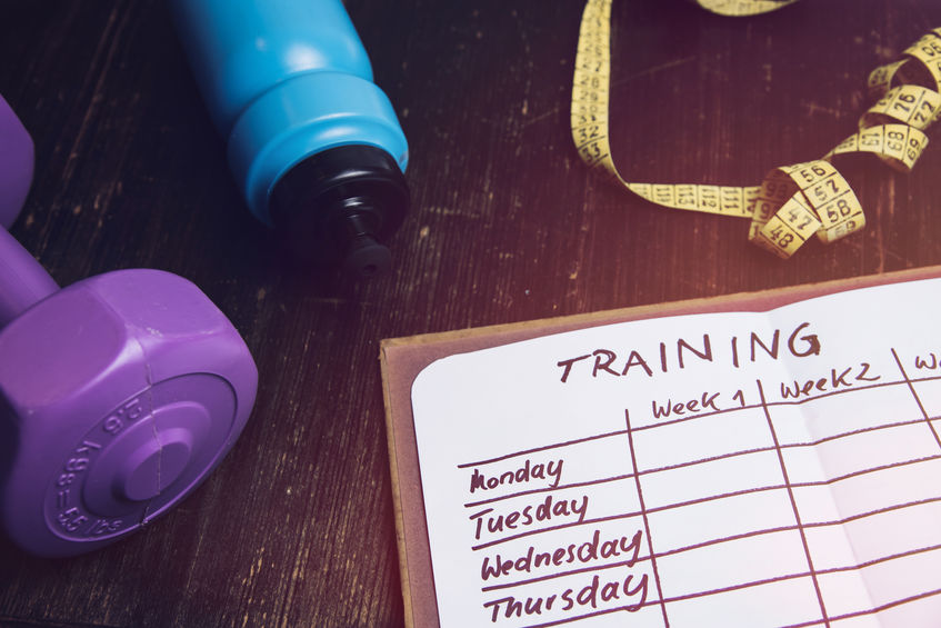 Woman wondering how to get motivated to work out at the gym when she doesn’t want to.