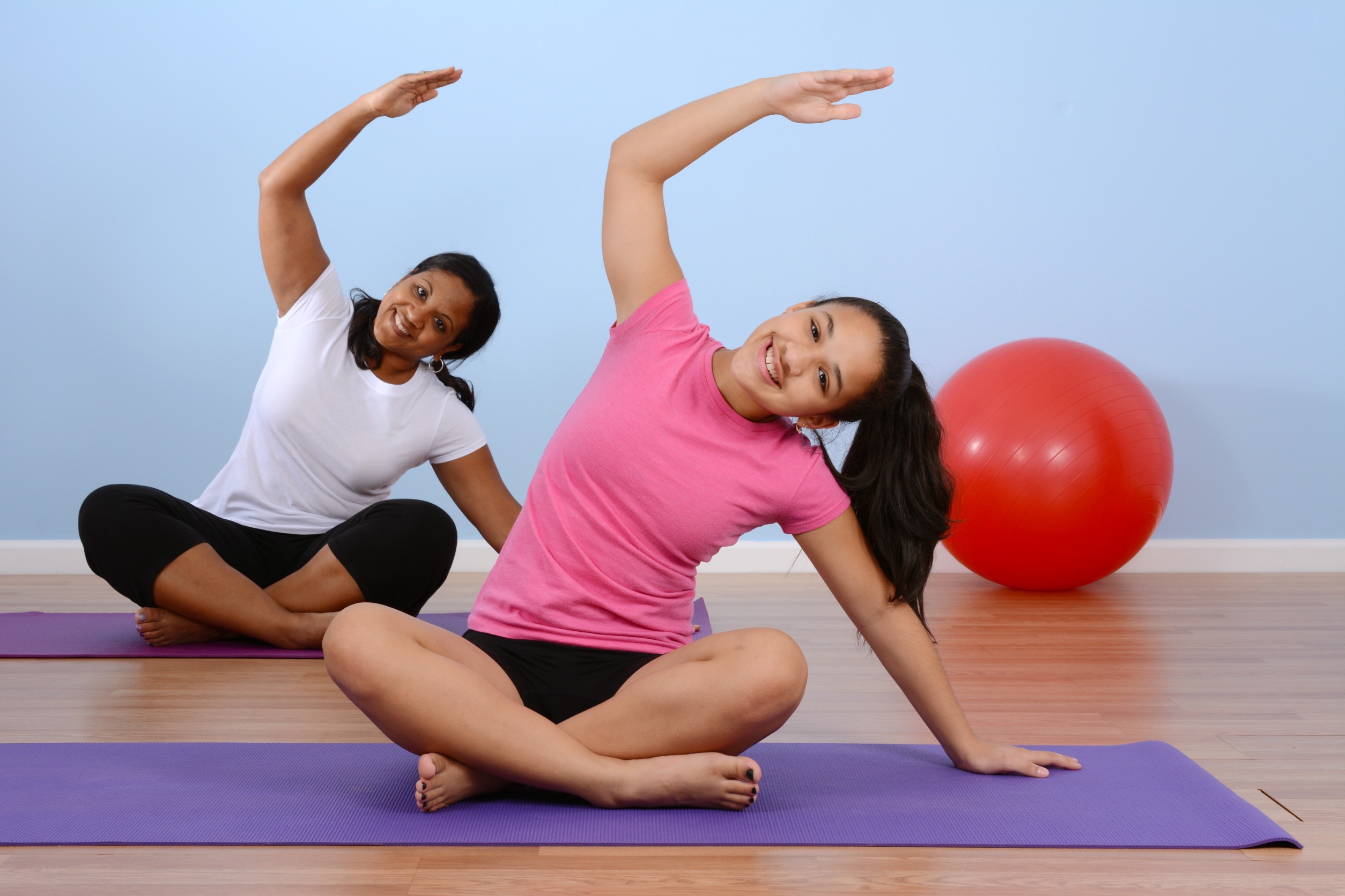 Teen girl working out in gym