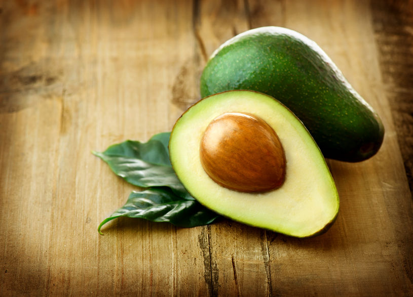 avocados on a wooden table