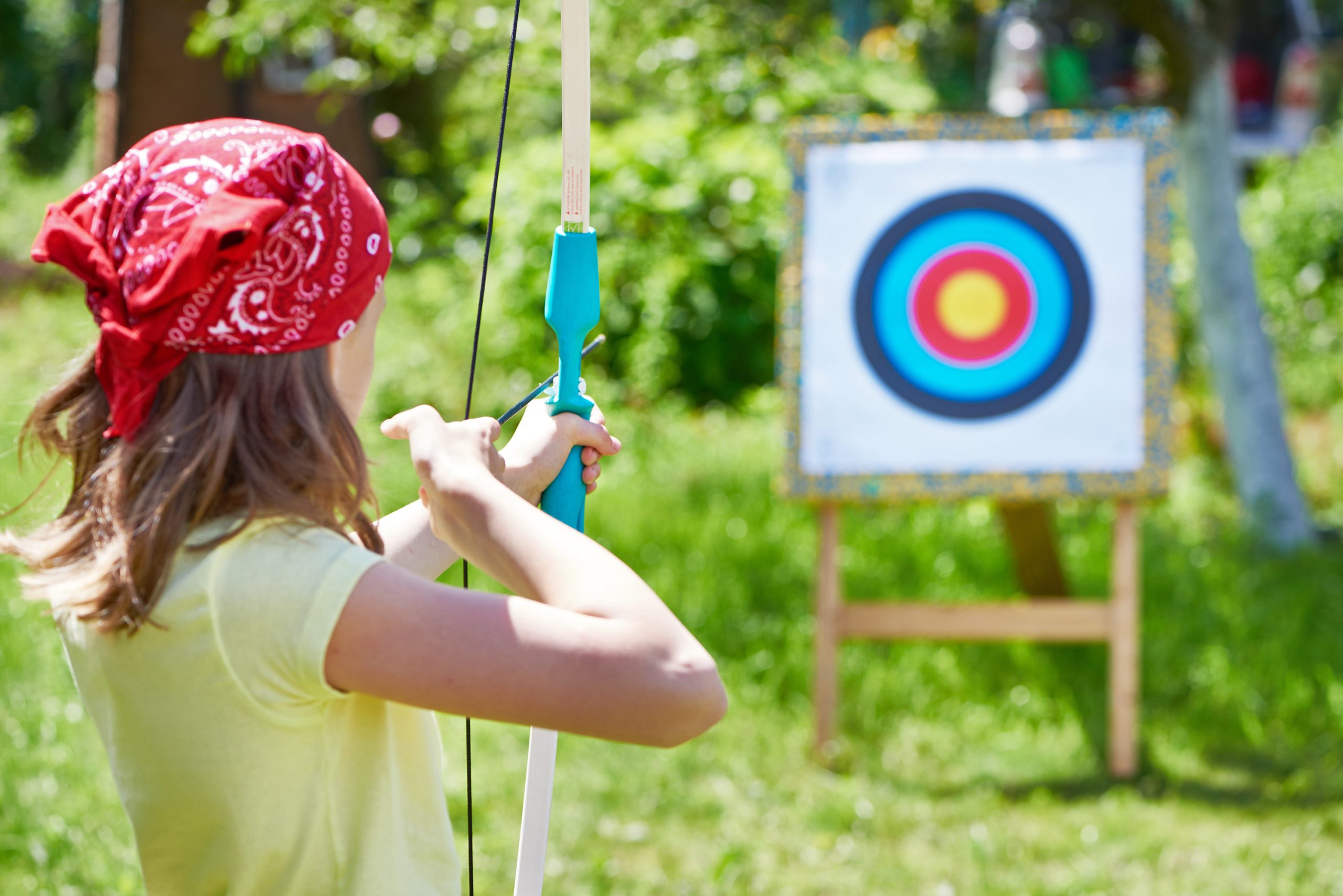 Child practicing archery