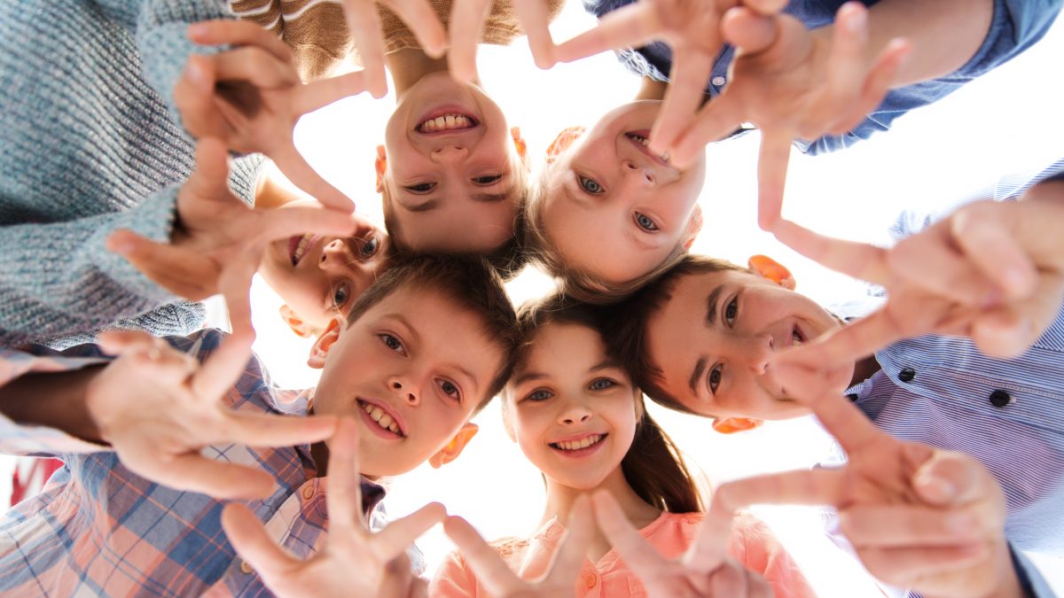 Kids gathered together in a circle