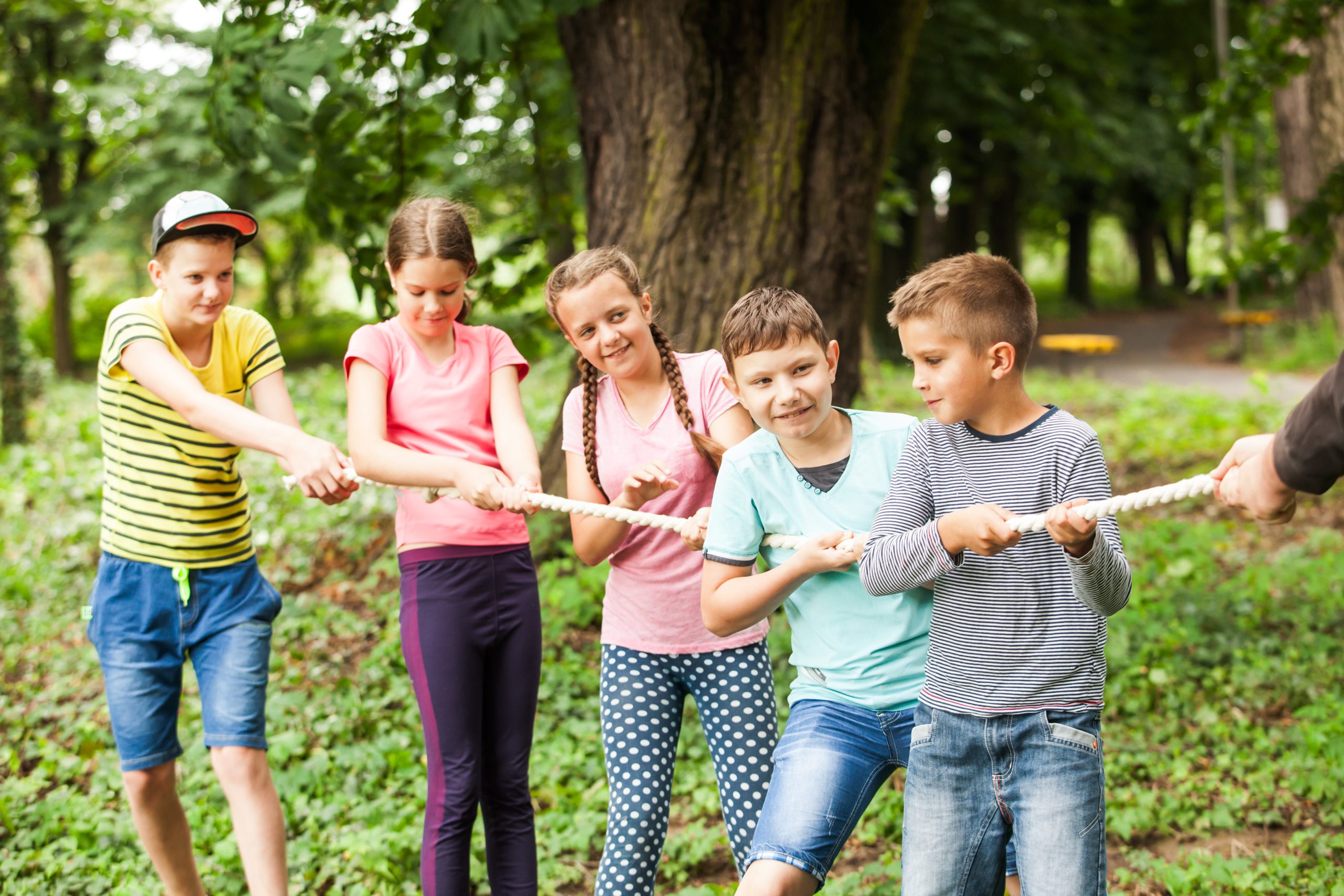 Kids playing tug of war together