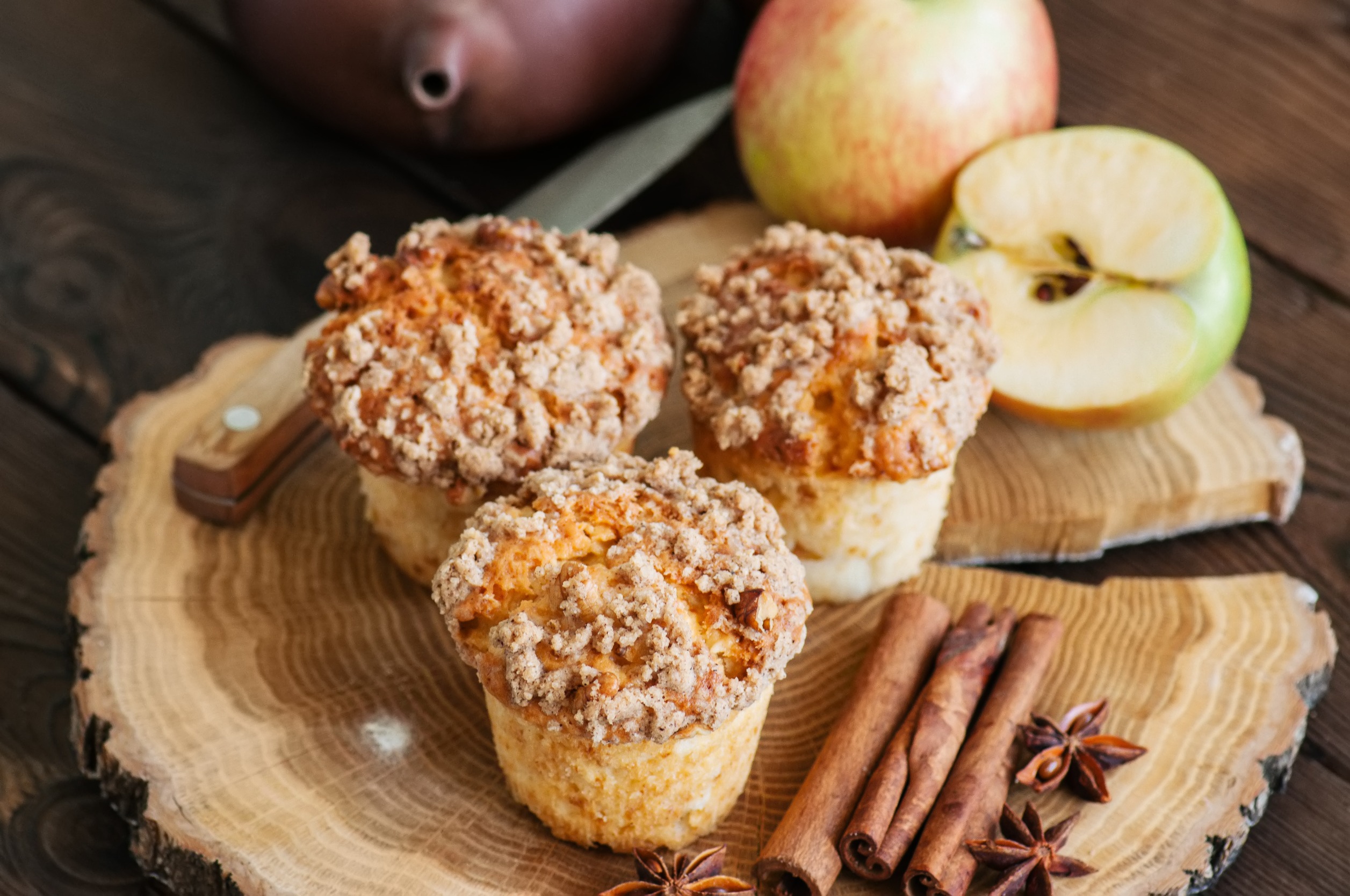 A pan of delicious apple muffins fresh out of the oven.