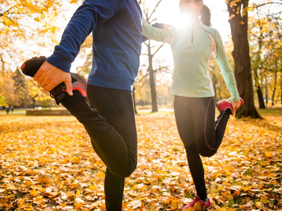 Couple enjoying new ways to exercise in the fall.