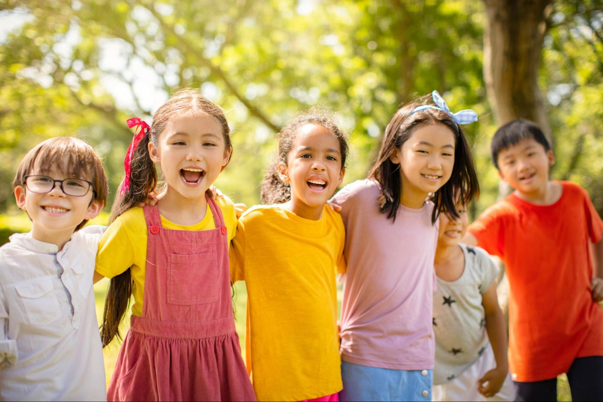 Children smiling at a YMCA summer camp