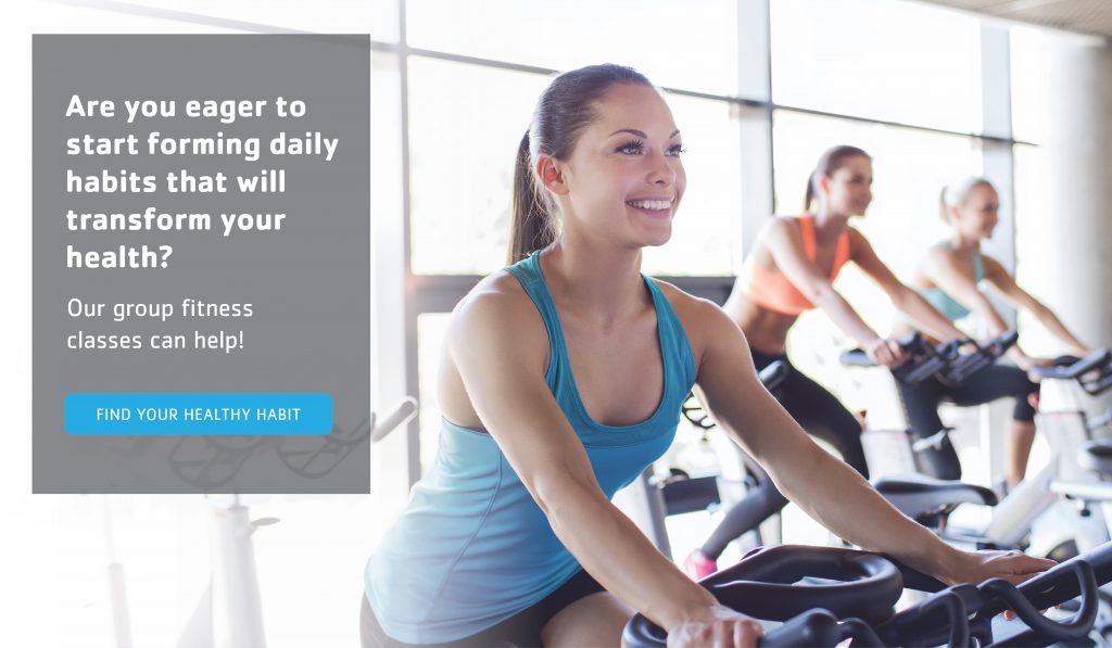 woman on a bike during a group fitness class