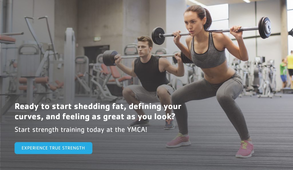 woman lifting weights for strength training at the gym