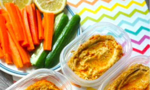 lemon hummus with carrot and cucumber sticks