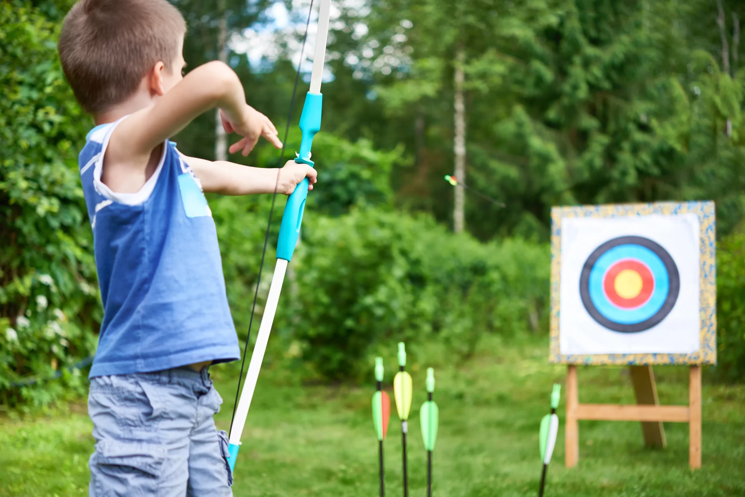 Boy practicing archery